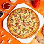pizza with cheese and green leaf